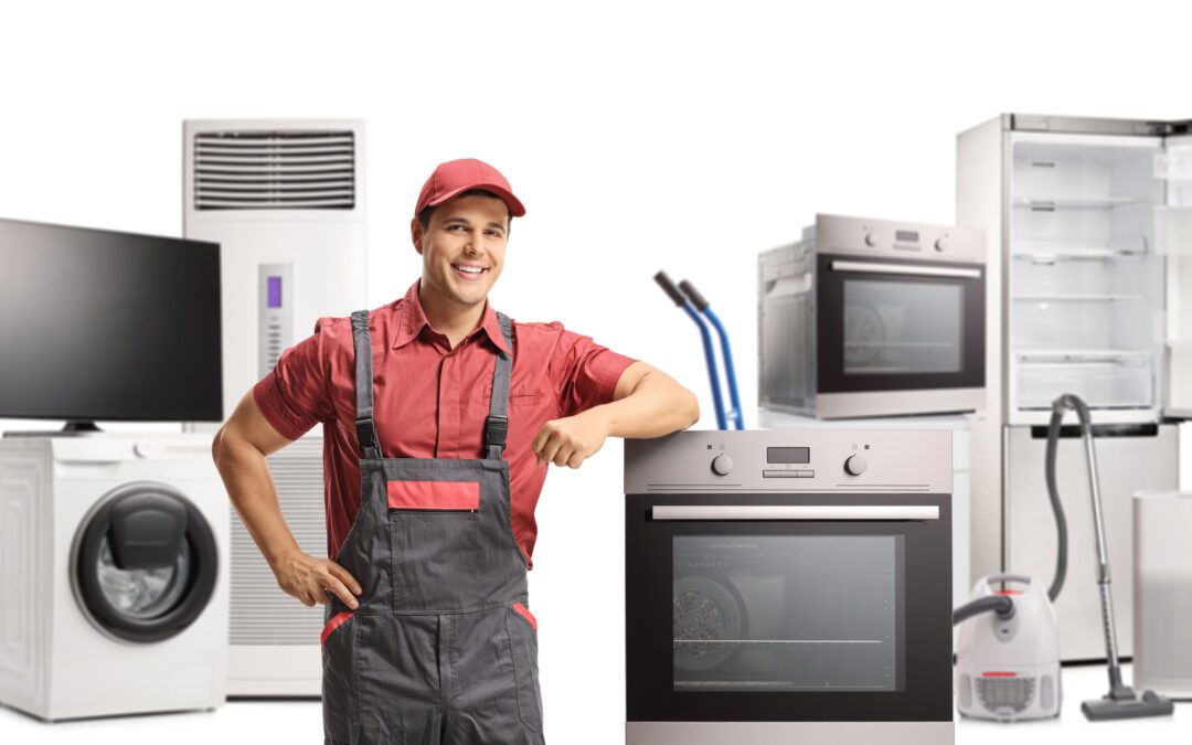 repairman in a uniform standing next to an electric oven and oth